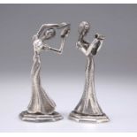 A PAIR OF SILVER FIGURES