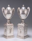 A PAIR OF NAPOLEON III SILVER URNS