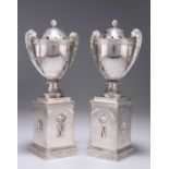 A PAIR OF NAPOLEON III SILVER URNS