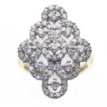 A 9 CARAT GOLD DIAMOND NAVETTE CLUSTER RING