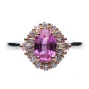 A PLATINUM AND 18 CARAT WHITE GOLD PINK SAPPHIRE AND DIAMOND CLUSTER RING