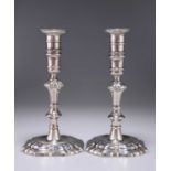 A PAIR OF IRISH CAST SILVER CANDLESTICKS, CIRCA 1740