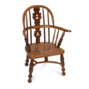 A 19TH CENTURY YEW WOOD CHILD'S WINDSOR CHAIR