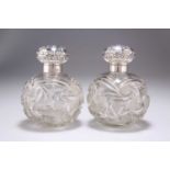 A PAIR OF EDWARDIAN SILVER-MOUNTED DRESSING TABLE JARS