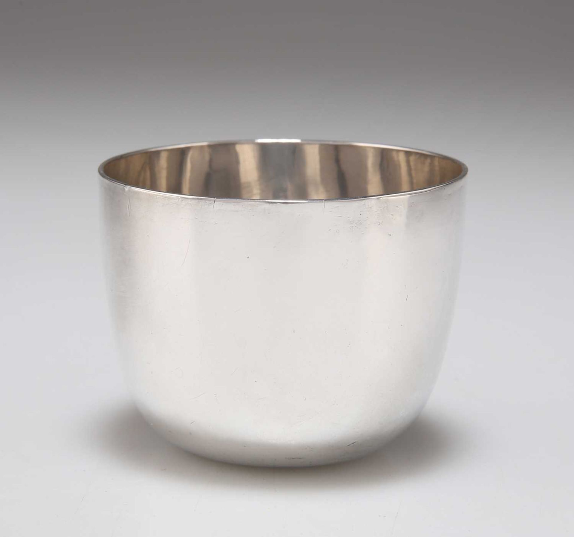 A GEORGE III SILVER TUMBLER CUP