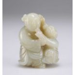 A CHINESE CARVED JADE FIGURE GROUP