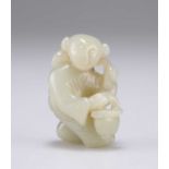 A CHINESE JADE FIGURE