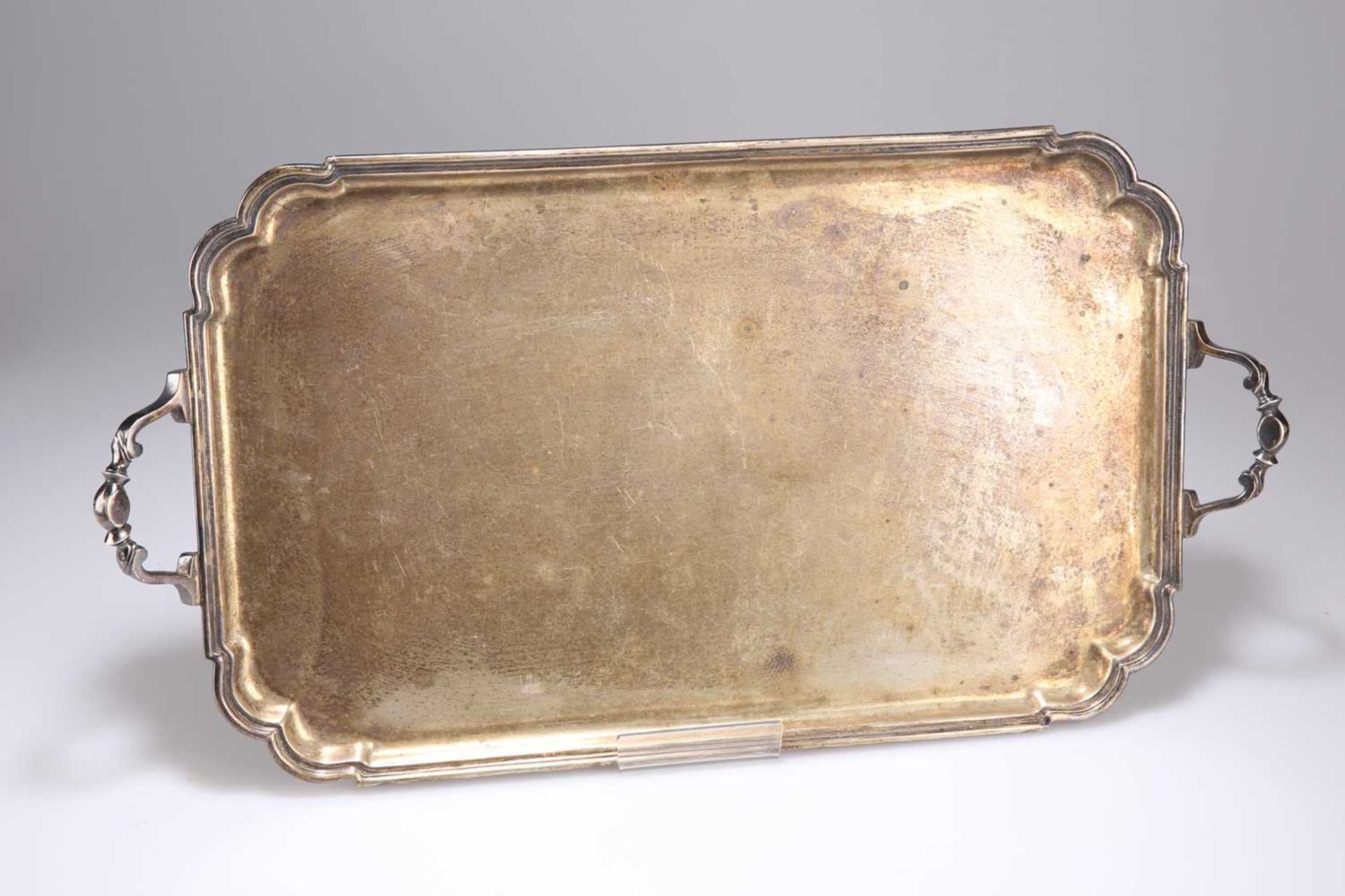 A GEORGE VI SILVER TWIN-HANDLED TRAY