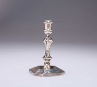 A LATE VICTORIAN SILVER TAPERSTICK