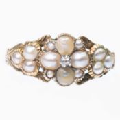 A VICTORIAN SPLIT PEARL CLUSTER RING