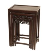 A NEST OF FOUR CHINESE HARDWOOD TABLES, EARLY 20TH CENTURY