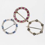 THREE GEM-SET HOOP BROOCHES