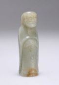 A CHINESE CARVED JADE TOGGLE WEIGHT