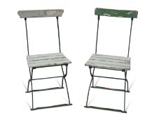 A PAIR OF EARLY 20TH CENTURY PAINTED WOOD AND IRON FOLDING GARDEN CHAIRS
