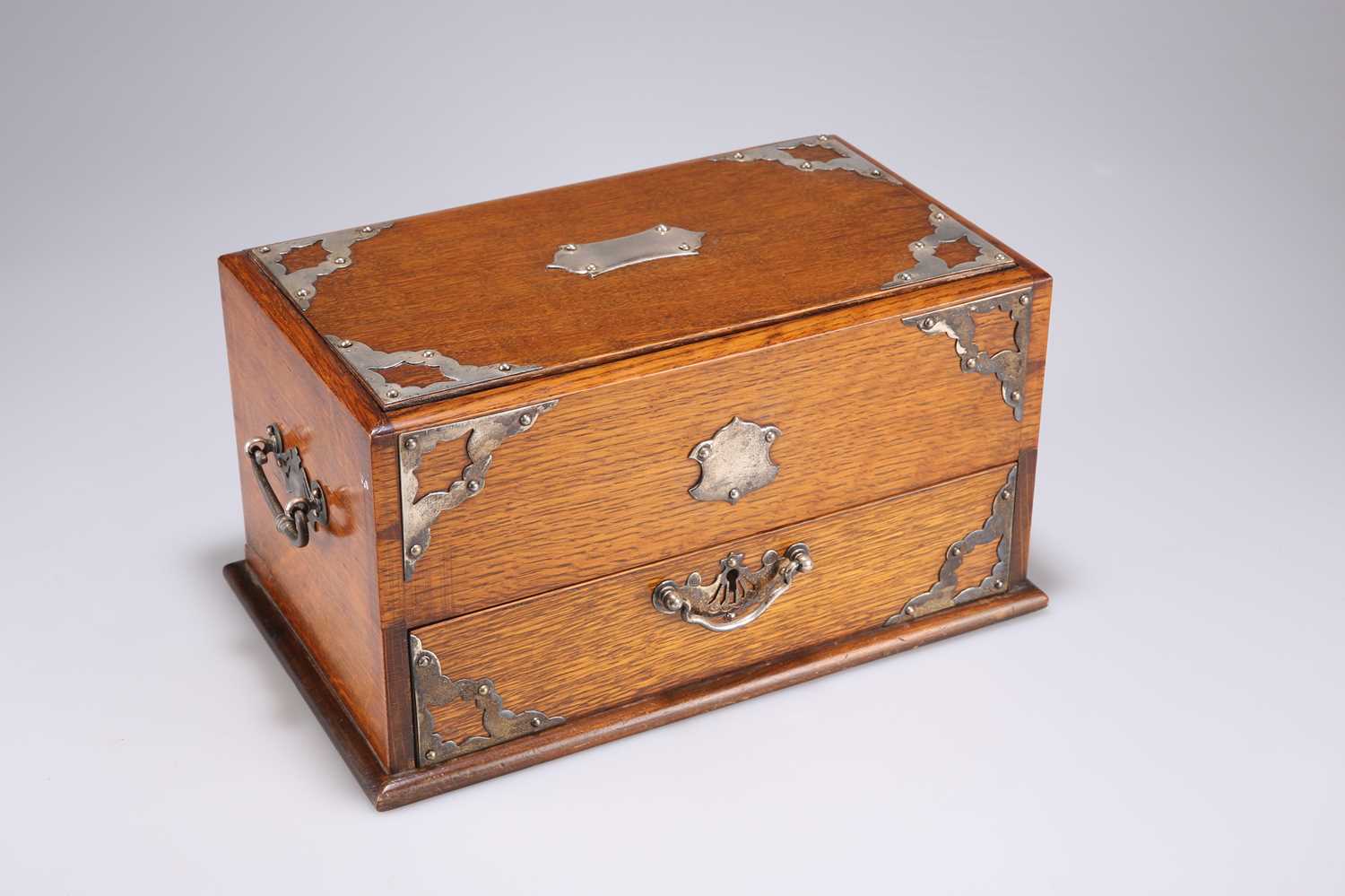 AN OAK SMOKER'S CABINET, CIRCA 1900