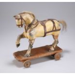 A 19TH CENTURY FOLK ART PULL-ALONG HORSE