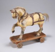 A 19TH CENTURY FOLK ART PULL-ALONG HORSE