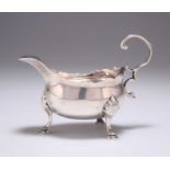 A GEORGE III SILVER CREAM BOAT