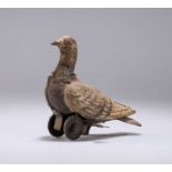 A GERMAN CLOCKWORK PIGEON, CIRCA 1900