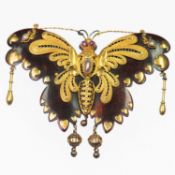 A 19TH CENTURY TORTOISESHELL, RUBY AND PEARL BUTTERFLY BROOCH