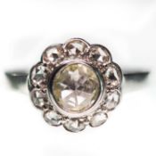 A ROSE-CUT DIAMOND CLUSTER RING