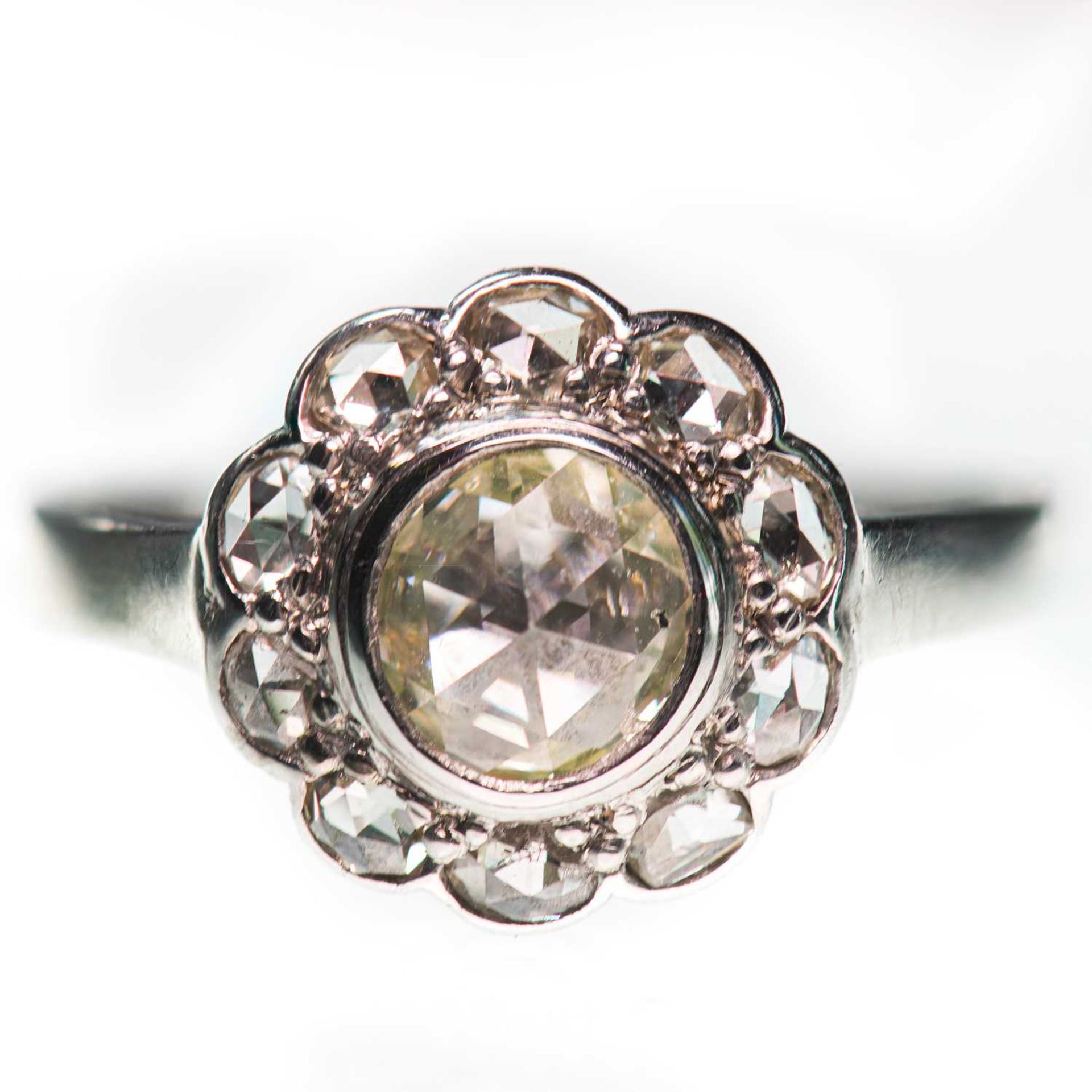 A ROSE-CUT DIAMOND CLUSTER RING