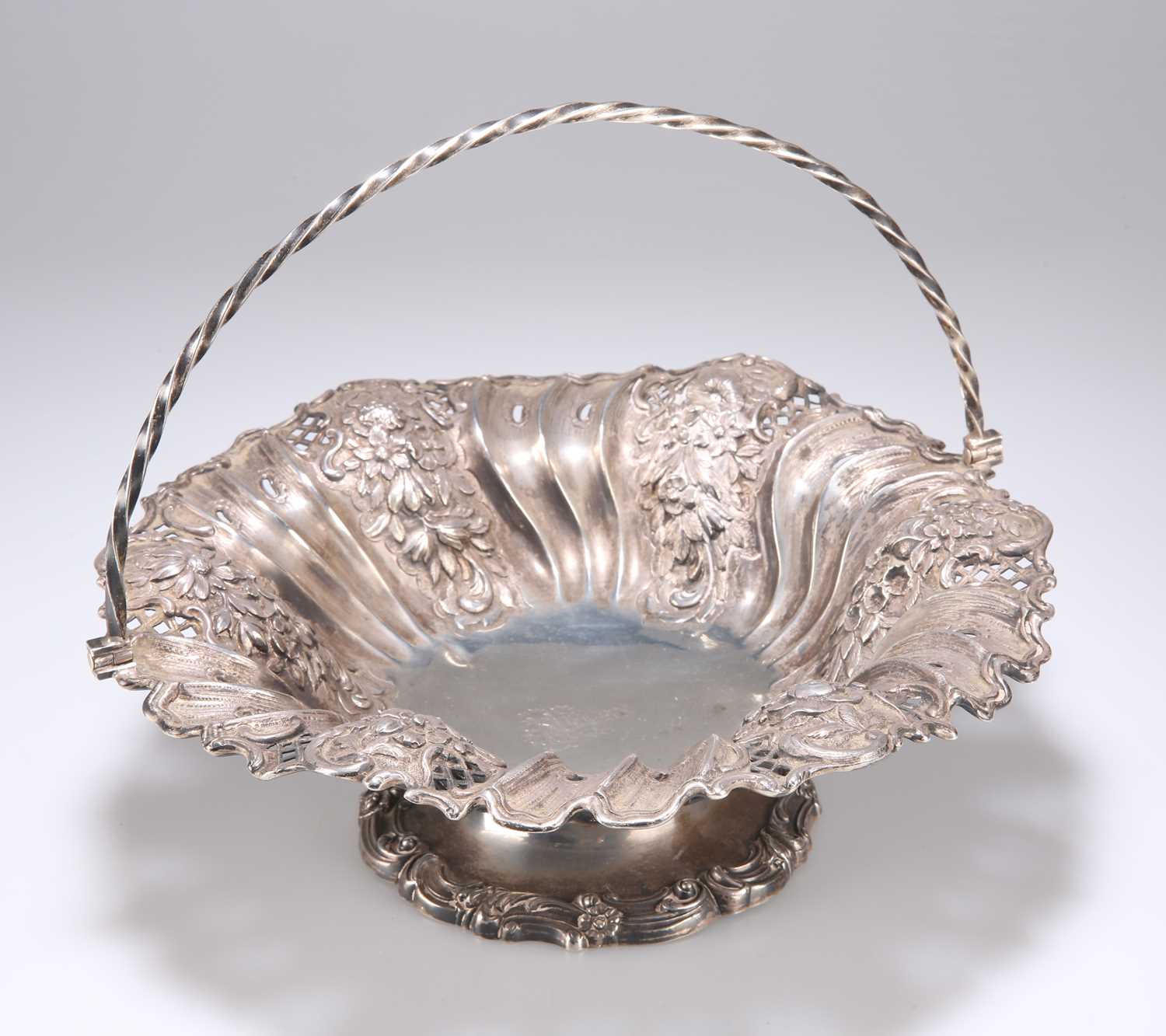 A WILLIAM IV SILVER SWING-HANDLE BASKET