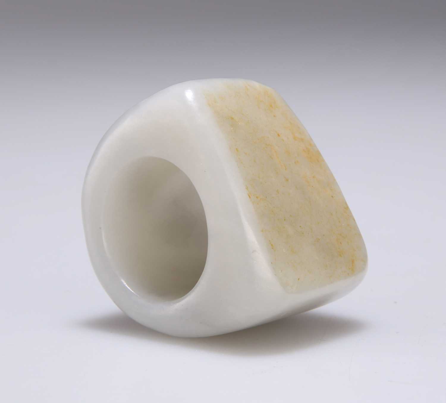 A CHINESE JADE ARCHER'S THUMB RING