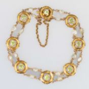 A LATE 19TH CENTURY PERIDOT AND PEARL BRACELET