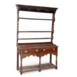 AN 18TH CENTURY OAK DRESSER AND RACK