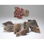 A COLLECTION OF ANTIQUE WOODEN FABRIC PRINTING BLOCKS