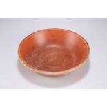 A ROMAN TERRACOTTA REDWARE DISH, NORTH AFRICAN, CIRCA 3RD CENTURY