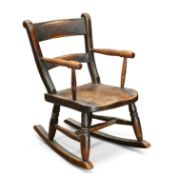 A 19TH CENTURY ELM AND OAK CHILD'S WINDSOR ROCKING CHAIR