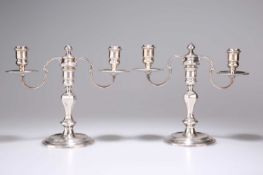 A PAIR OF SILVER-PLATED TWO-LIGHT CANDELABRA