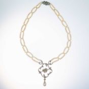 A CULTURED PEARL AND DIAMOND PENDANT NECKLACE