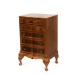 A GEORGIAN STYLE BURR WALNUT SERPENTINE CHEST OF DRAWERS