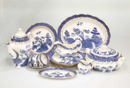 A ROYAL DOULTON 'BOOTHS REAL OLD WILLOW' PATTERN DINNER SERVICE