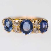 A LATE VICTORIAN 18 CARAT GOLD SAPPHIRE AND DIAMOND RING
