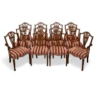 A SET OF TWELVE HEPPLEWHITE STYLE MAHOGANY DINING CHAIRS, BY WILLIAM TILLMAN