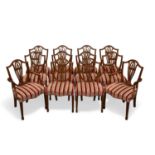 A SET OF TWELVE HEPPLEWHITE STYLE MAHOGANY DINING CHAIRS, BY WILLIAM TILLMAN