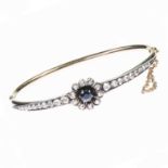 A LATE 19TH CENTURY SAPPHIRE AND DIAMOND HINGE OPENING BANGLE