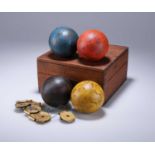 A SET OF FOUR CROQUET BALLS, LATE VICTORIAN / EDWARDIAN