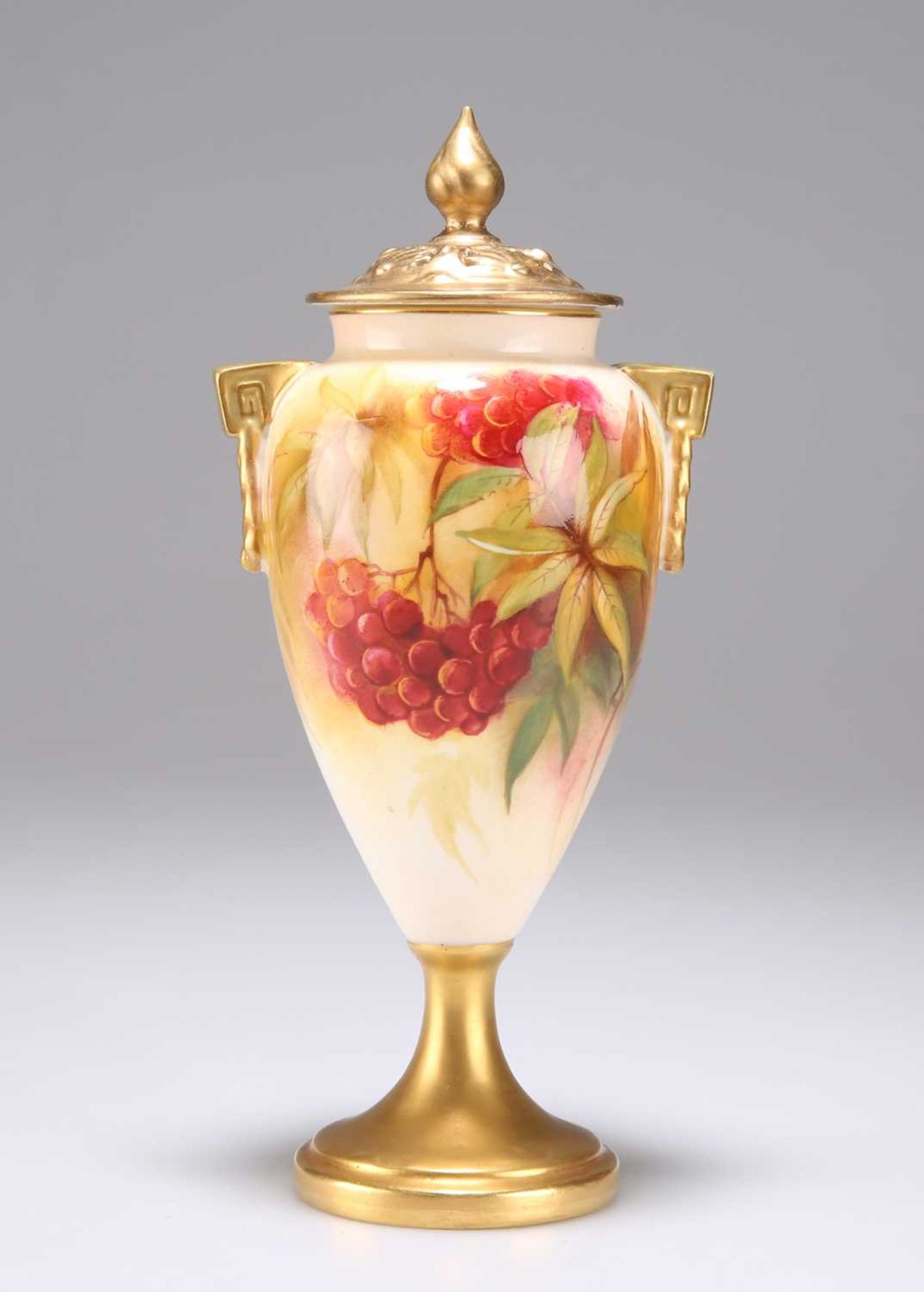 A ROYAL WORCESTER VASE AND COVER