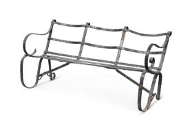 A 19TH CENTURY PAINTED CAST IRON GARDEN BENCH