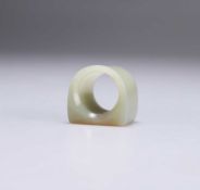 A CHINESE JADE ARCHER'S THUMB RING