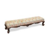 A VICTORIAN ROSEWOOD AND UPHOLSTERED FOOTSTOOL