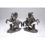 AFTER COUSTOU, A PAIR OF 19TH CENTURY BRONZE MODELS OF THE MARLY HORSES
