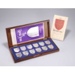 ROYAL INTEREST: A SET OF TWELVE ELIZABETH II SILVER INGOTS, "THE ROYAL ARMS"