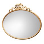 A LATE 19TH CENTURY OVAL WALL MIRROR