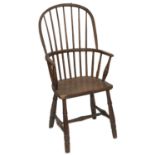 AN EARLY 19TH CENTURY OAK STICK-BACK PRIMITIVE WINDSOR CHAIR